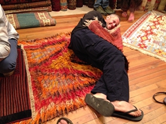 Robby lying on a shaggy goat hair carpet; Goreme
