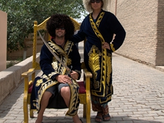 Dressed in traditional telpak hats (Uzbek-Turkmen hats designed to look like a huge ball of sheep's wool or a wig); Khiva