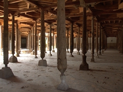 Some of the 218 wooden columns supporting the roof of the Juma Mosque; Khiva