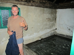 Robby wastes no time taking advantage of the natural hot springs (enclosed by wooden sheds) at Altyn Arashan Nature Reserve