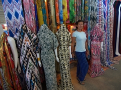Becky mimics the mannequin pose; Kashgar bazaar