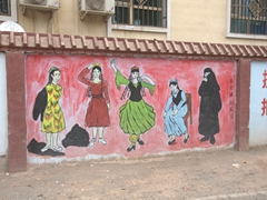 A wide range of outfits worn by Uigur women; Turpan