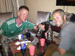 Lars and Robby drinking their aged 12 years bottles of Jeike Chalixun whiskey, a bargain at 40 Yuan!