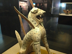Painted clay beast on display; Turpan Museum