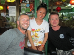 Robby and Lars with our Bamboo Lounge waitress. We wanted her "I love Laos" beerlao t-shirt!