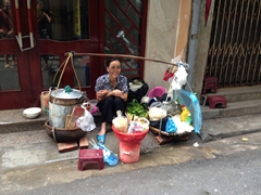 Our happy street food vendor; Hanoi