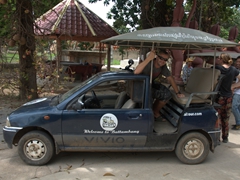 Robby enjoying his ride on our car-converted-to-a-tuk-tuk; Battambang