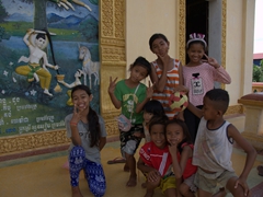 Happy kids posing for photos; Wat Sanker