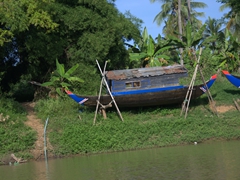 Boat maintenance along the Tonle Sap river