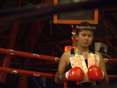Female muay thai kickboxer