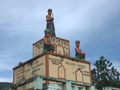 Monument statues at a grave; Ambarita Village