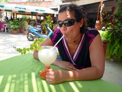 Becky sipping on a giant margarita; Santa Cruz