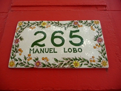 Colorful plaques adorn many of Colonia's side streets