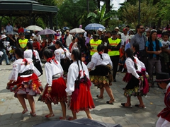Girls wearing pretty outfits at the Pase del Niño Viajero