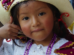 Portrait of a cute girl in the Pase del Niño Viajero