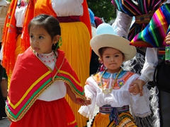 Close up of two sisters in the Pase del Niño Viajero
