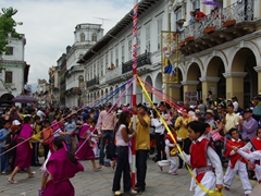 The street parade takes all day as frequent stops for dancing (such as this performance) occur at Parque Calderon; Pase del Niño Viajero