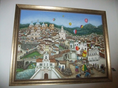 Nice depiction of Cuenca and the lighting of paper lanterns for Corpus Christi