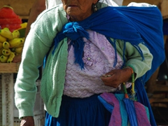 Indigenous woman shopping at Gualaceo mercado