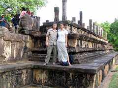 Posing in front of an Audience Hall famous for its granite pillars and friezes of elephants, lions, and dwarfs, Polonnaruwa