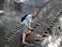 Robby climbing ancient steps to Sigiriya