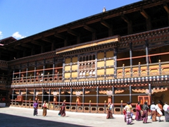 Paro Tsechu visitors pay respects to the Paro Dzong