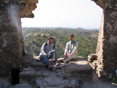 Robby & Becky pose in a giant opening at Rohtas Fort