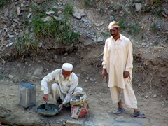 Workers at Takht-i-Bahi Buddhist ruins