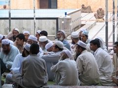 Devotees hearing a lecture at Mahabat Khan Mosque, Peshawar