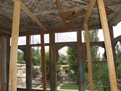 Laborers are painstakingly trying to preserve the ceiling's murals of the Khaplu Fort