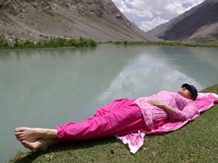 Becky immediately celebrates by soaking her feet in the freezing cold lake and lying out for a quick nap