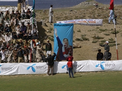 Just before the morning polo match kicked off, these supporters erected a Benazir Bhutto poster