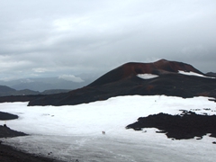 The 2010 eruption of the Eyjafjallajökull volcano resulted in a brand new volcano on the Fimmvörðuháls trail (the red volcano in the distance)