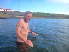 Minutes later, Robby enters the frigid ocean (11°C)