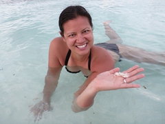 Becky picking up a tiny crab; Raidhiga Island