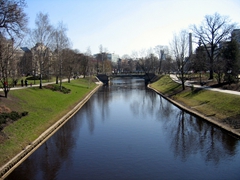 Dividing the Old Town from the Central District (with the Freedom Monument in the middle), Bastejkalns Park itself is divided by the winding Pilsetas Canal