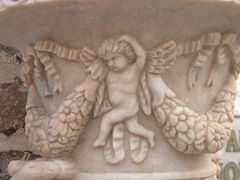 Detail of a marble vase; Oia
