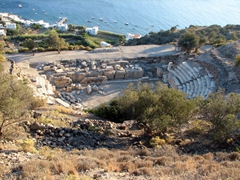 Bird's eye view of the amphitheater and the sea beyond; Trypiti