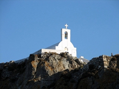 The church of Agios Ioannis Theologos (St John) is carved onto a rock on top of the ruins of the ancient temple of Athina