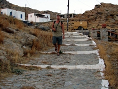 Robby walking down the ancient footpath linking Hora to the waterfront port of Livadi