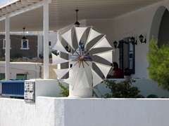 This miniature windmill was spinning furiously due to the day's abnormally strong fall winds (meltemi)
