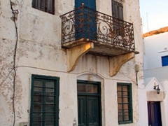 Wrought-iron balconies add so much character to Hora