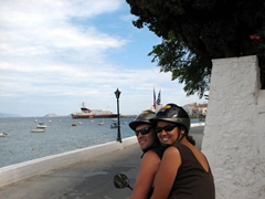 Robby and Becky zooming off towards Spetses Town on their scooter (after successfully circumnavigating Spetses's 24 km loop)