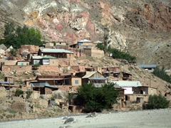 Mud brick village at the base of the Fann Mountain range