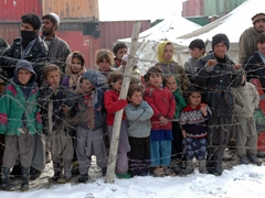 Refugees lined up to receive some donations to keep warm during one of Afghanistan’s harshest winters. Sadly, the night before we arrived, 6 members of the refugee camp froze to death…that made our mission there even more important as we had hundreds of warm blankets and clothes to distribute