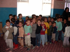 The boys jostle amongst themselves to get situated in the mandatory line formation at the Allahuddin Orphanage