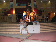 Everyone strikes a pose next to some famous statue at Philipsburg Harbor