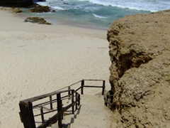 Steps leading down to an inviting beach