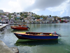 Colorful fishing boats in Carenage Harbor