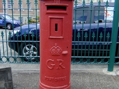 British pillar style post box